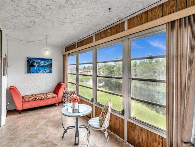 Building Photo - 6570 Royal Palm Blvd