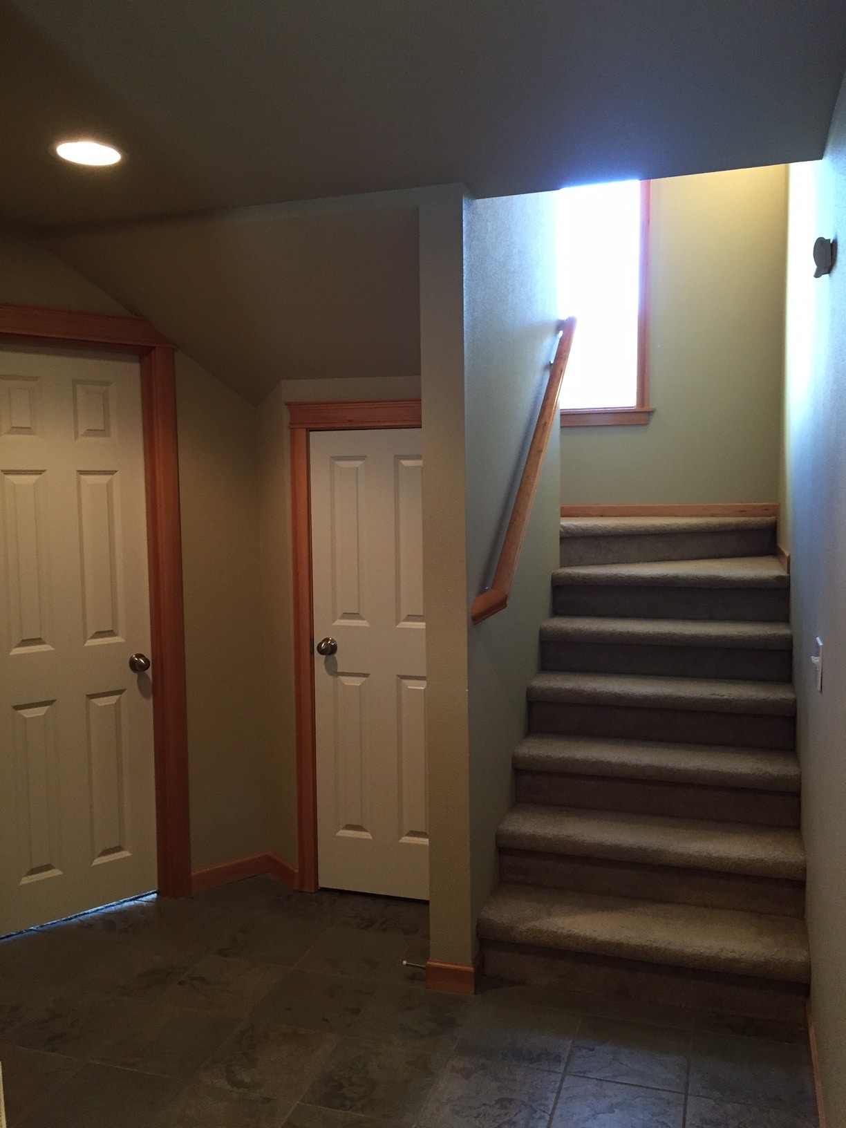 Entry to den and stairs to main floor - 320 25th Ave S