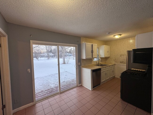 Building Photo - AVAILABLE NOW - Nicely rehabbed 3 Bedroom Single Family Home with Garage and Very Large Backyard