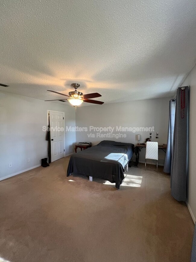 Building Photo - 6004 Players Pl