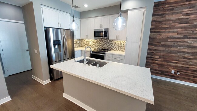 Building Photo - Coming Soon! Modern Tri-Level Smart Townho...