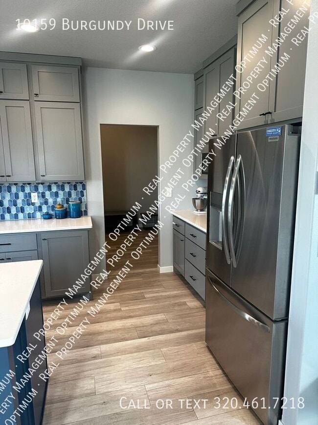 Building Photo - 10159 Burgundy Dr