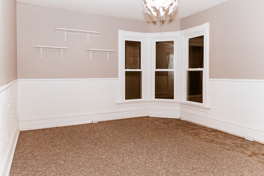 Bedroom 1 with view from living room wall - 327 S Adams St