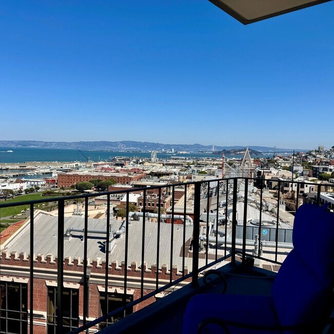 Building Photo - Just Unpack, Pour a Beverage, & Cue the Su...