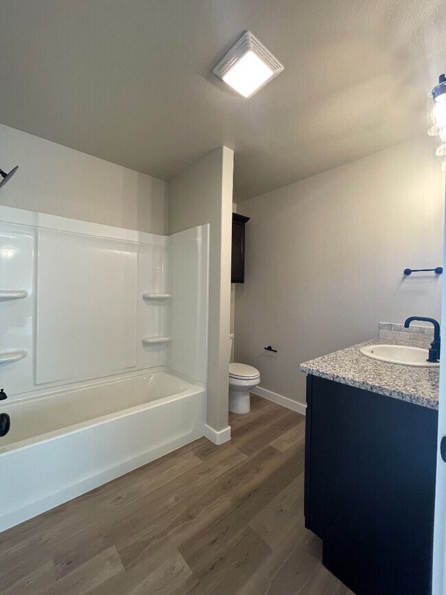 Building Photo - Brand new 3 bd/2 bth home in quiet neighborhood! Turf backyard with plants! All appliances! 10 mi...