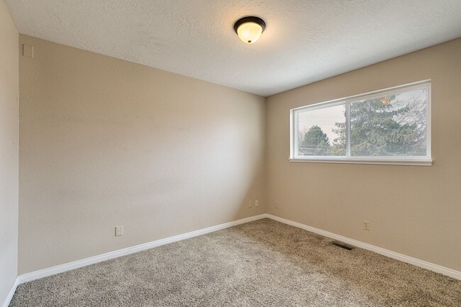Building Photo - Large home with shop on over 1/2 acre.
