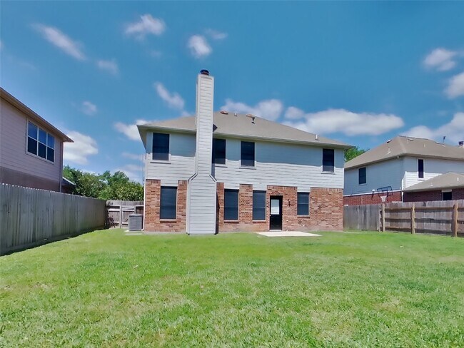 Building Photo - 18810 Woodbreeze Dr