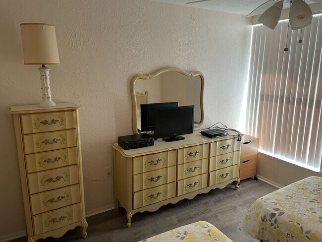 Building Photo - 1/1 Furnished with Lake View & Utilities in Tahitian Gardens a 55+ Community.