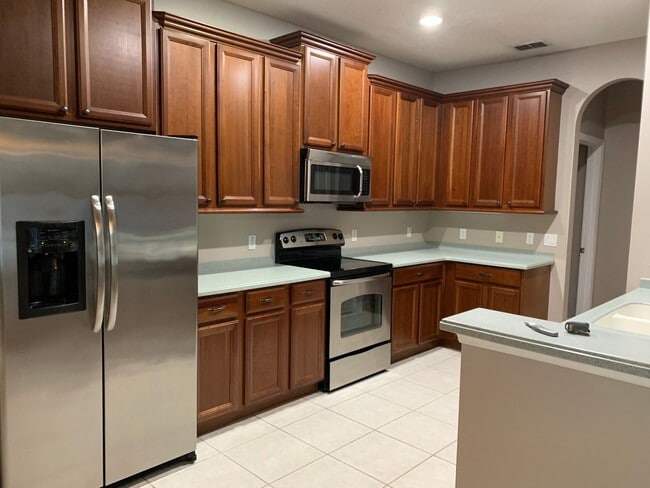 Building Photo - MOVE IN SPECIAL- Charming 3/2 home w/ formal office/4th bedroom and fenced yard in Harmony