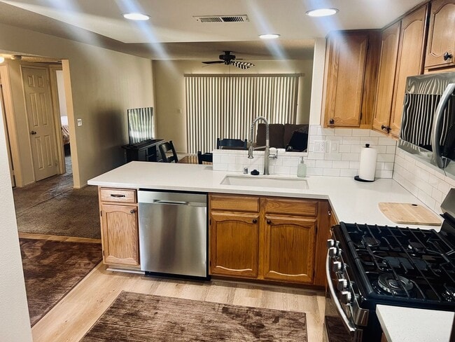 Building Photo - Affordable Comfort in 55+ Guard-Gated Comm...