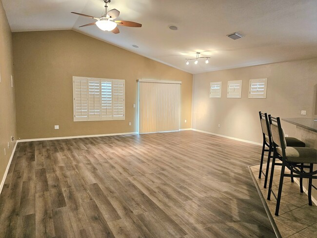 Living Room with vaulted ceilings - 11063 W Coppertail Dr