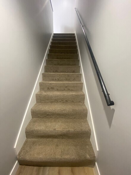 Unit B Bottom View Stairs - 415 Dequincy St