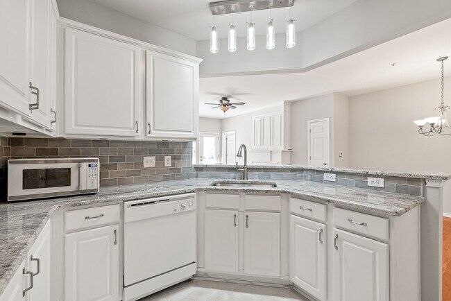 Building Photo - Prime Ballantyne Living: 2-Bedroom, 2-Bath Condo