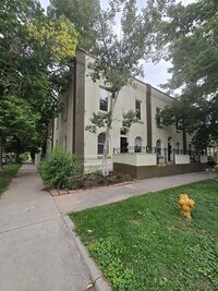 Building Photo - This updated and welcoming condo in the he...