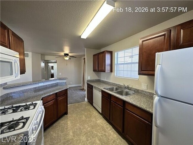 Building Photo - Bright Northwest Second-Floor Condo with Oversized Balcony & Community Pool!