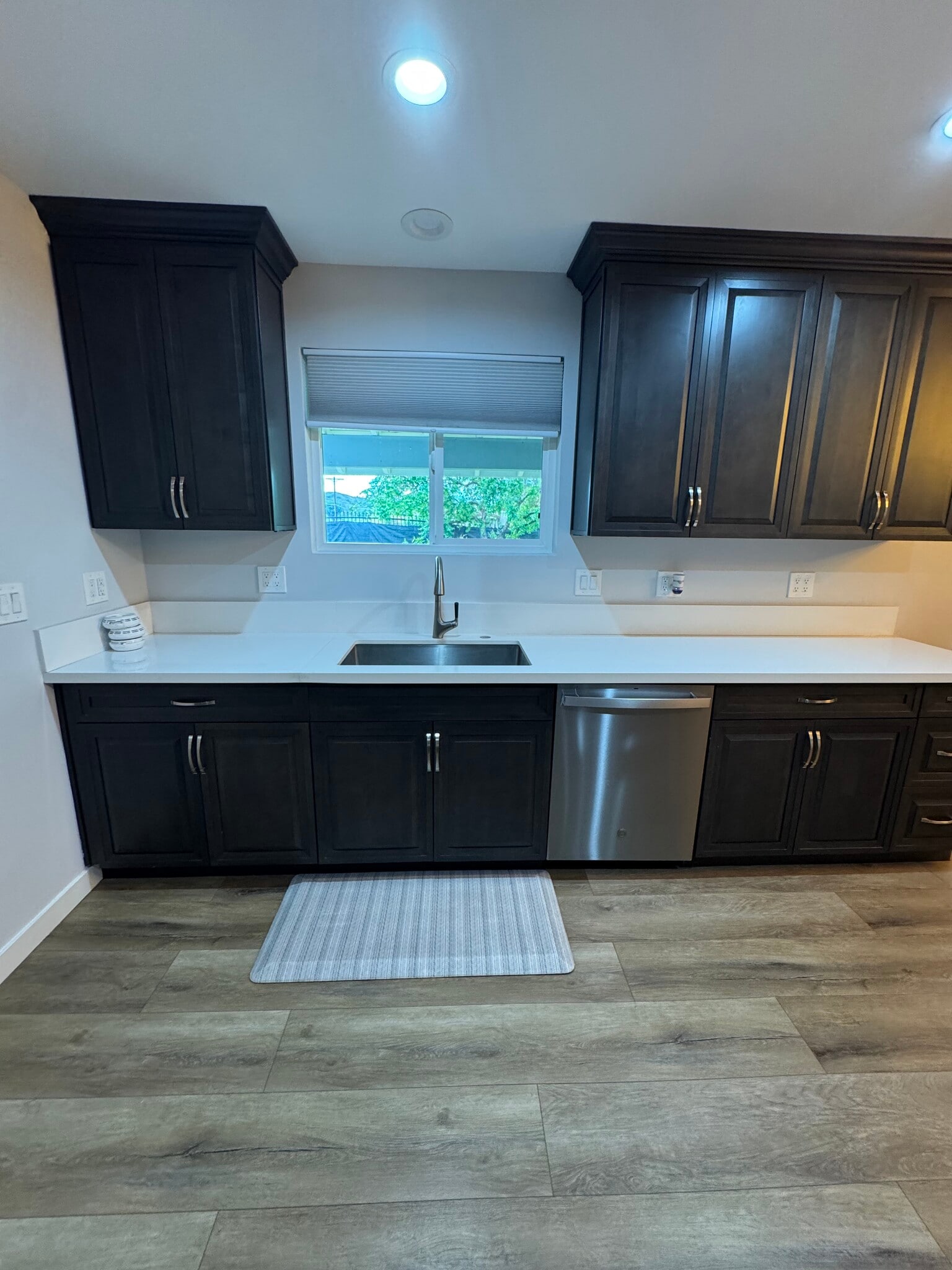 Kitchen sink and window in house - 11305 Sheldon St