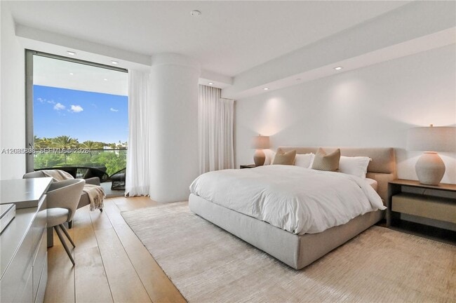 Building Photo - 10203 Collins Ave
