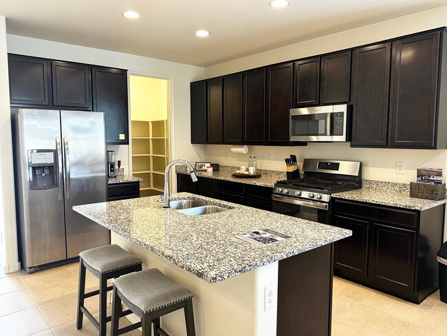 Building Photo - BEAUTIFUL VERRADO 3 BEDROOM PLUS DEN WITH ...