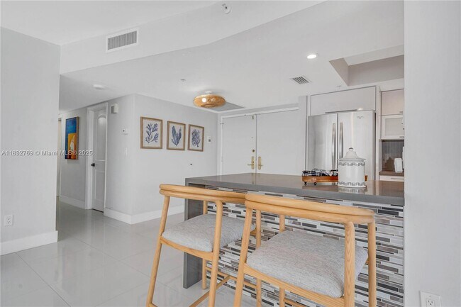 Building Photo - 10175 Collins Ave