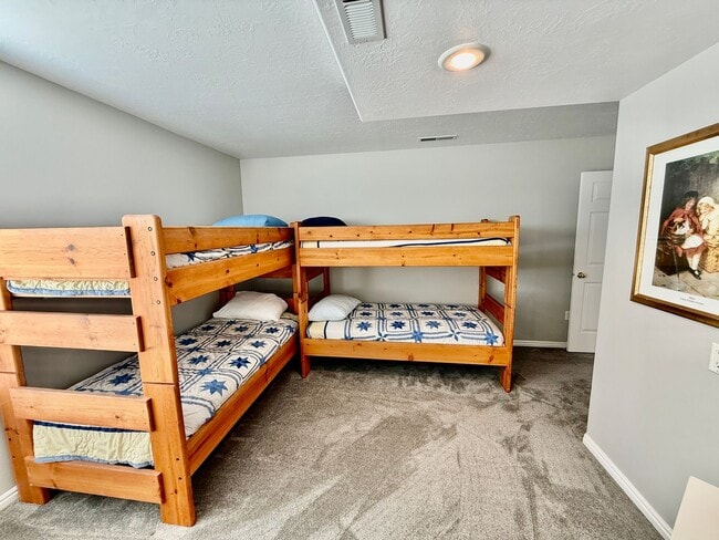 Building Photo - Furnished and Utilities Included: Two-Bedroom Basement Apartment with Private Yard