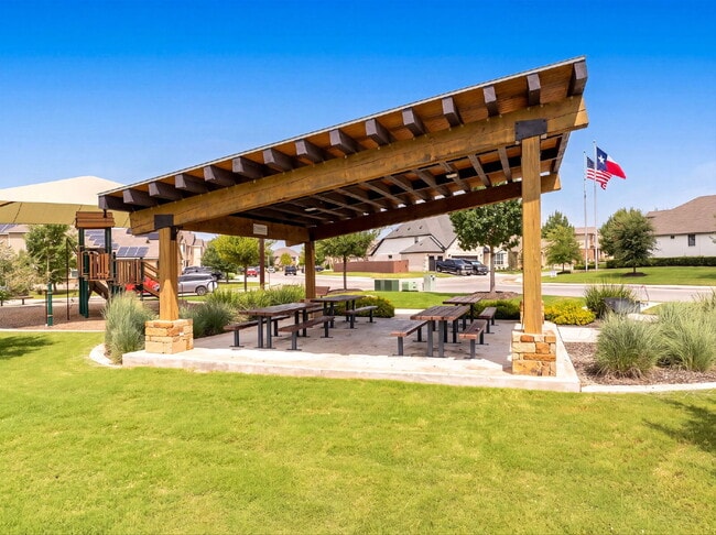 Building Photo - Greenbelt. 3 Car Garage. Built In Dog Room.