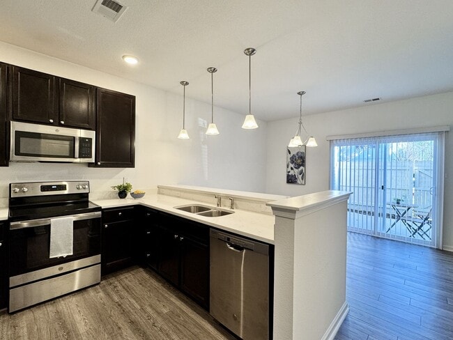 Building Photo - Available NOW! 1st Time Rental! Water, Sewer Trash, Landscaping, Community Pool Included!