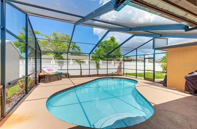 Building Photo - 7316 Caladesia Dr