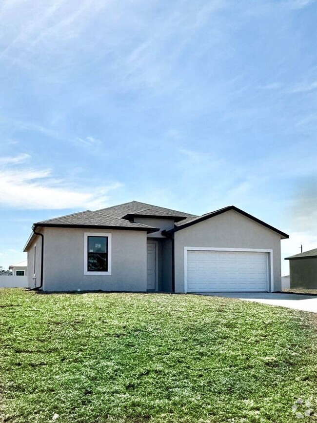 Building Photo - Newer Home with a Spacios open floor concept.