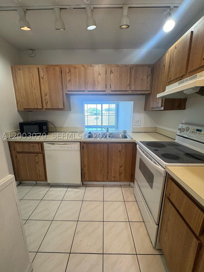 Building Photo - 7410 Woodmont Terrace