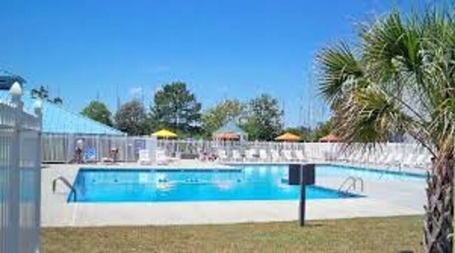 Building Photo - Townhome Style Loft Condo Gated Marina Community + Utilities Included!