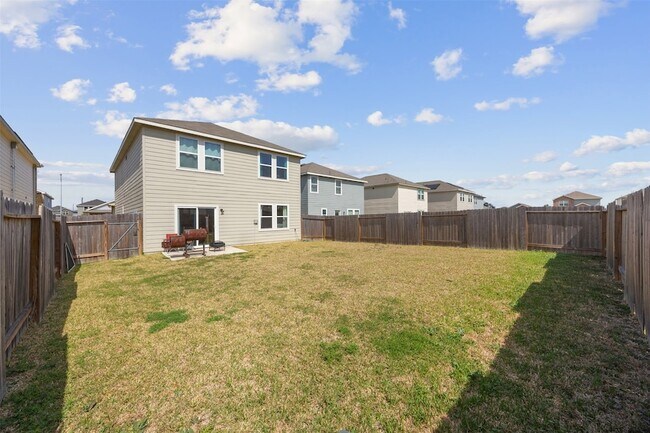 Building Photo - 7826 Pink Dahlia Dr