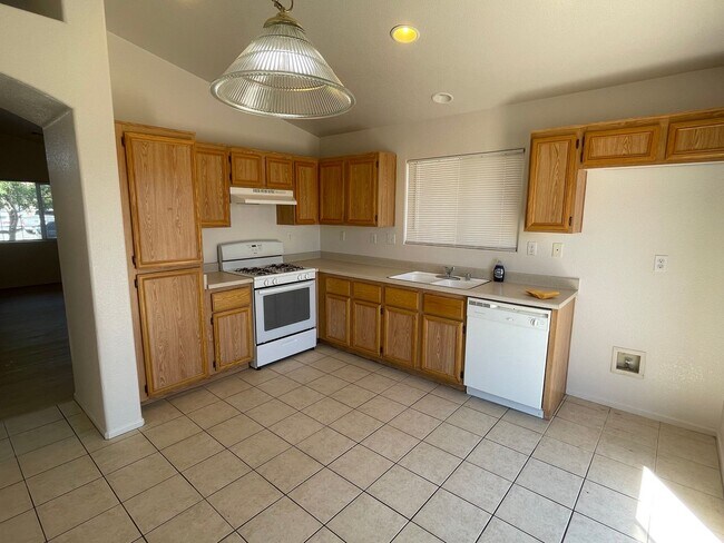 Building Photo - Adelanto Home-3 Bedrooms,2 Bathrooms, Laminate Floors, Indoor Laundry Room, Large Back Yard