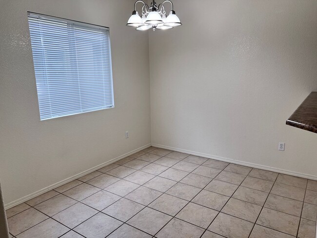 Building Photo - Wonderful 3 Br condo in gated community with the major appliances and 1 car garage.