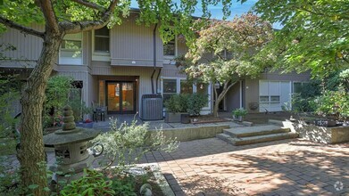 Building Photo - Spacious split level condo