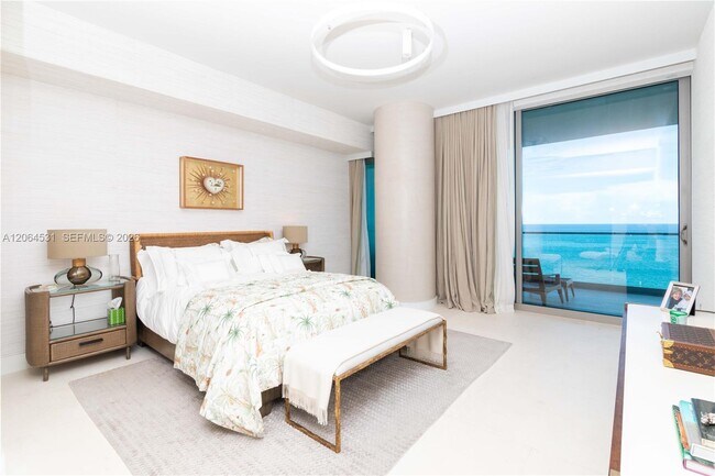 Building Photo - 10201 Collins Ave