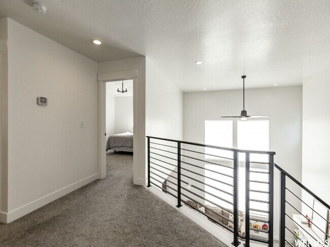 Building Photo - Spacious Open Floor Plan Available Soon!