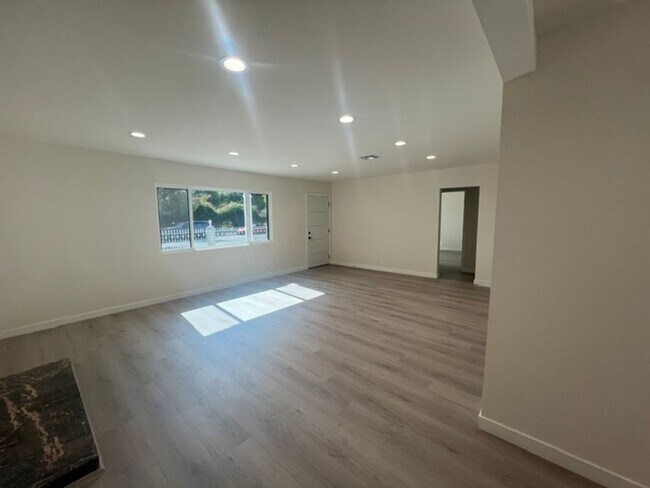 Building Photo - 7317-7321 Garden Grove Avenue