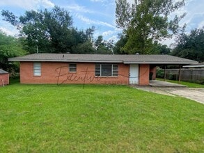Building Photo - Updated 3BR Brick Home with Covered Carpor...