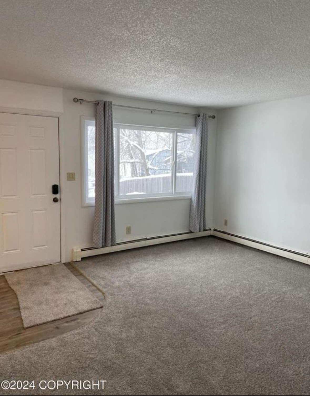 Building Photo - 8530 Kluane Ave