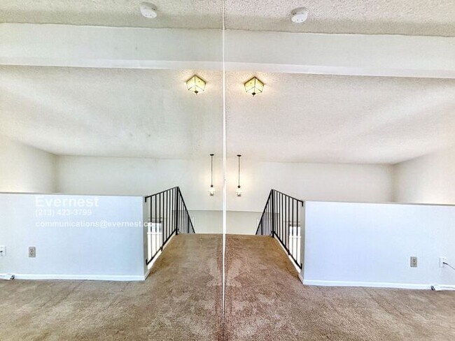 Building Photo - Lovely 2-Bed, 2-Bath Condo with Great Loca...