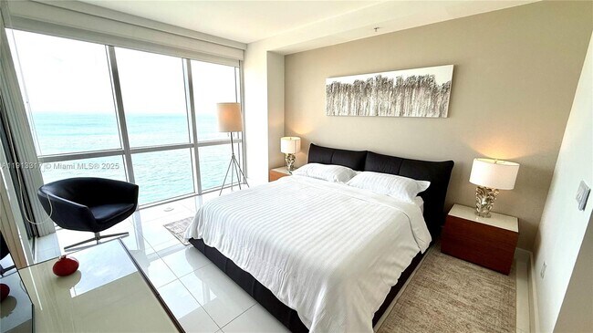 Building Photo - 18201 Collins Ave