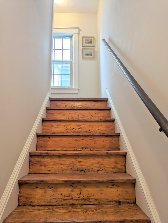 Hardwood stairs with handrail - 7216 W Clinton Ave