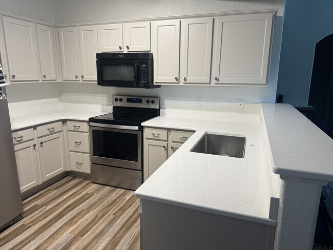 Building Photo - Beautifully Remodeled 3-Bed Condo in the Heart of Parker — Ground-Level, Stylish, and Steps From ...