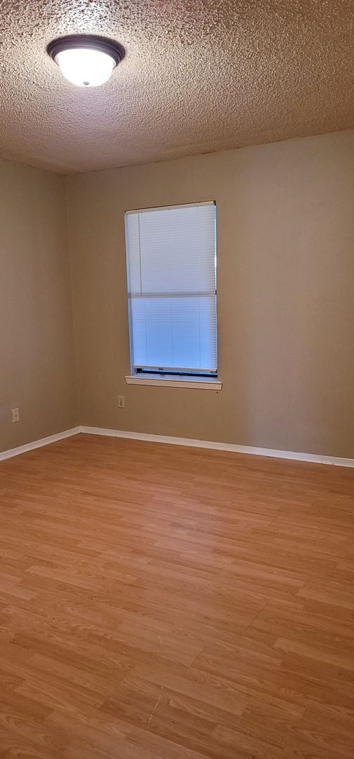 Building Photo - 3 Bedroom and 2 Bath Duplex with Carport a...