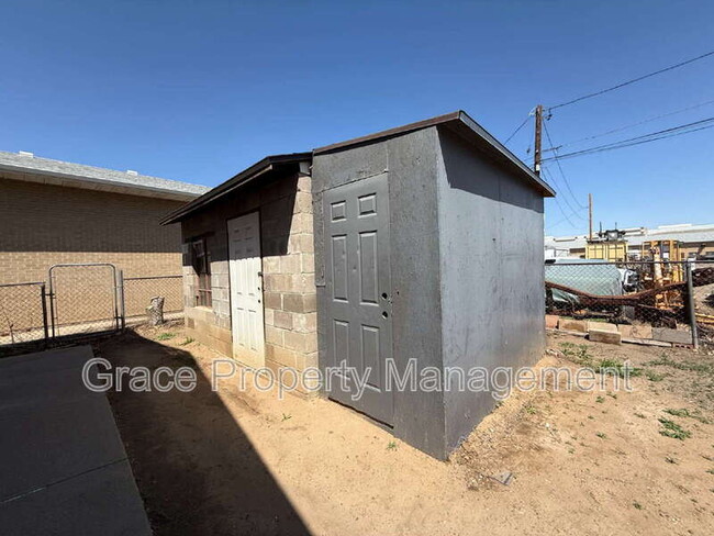 Building Photo - 1149 E 58th Ave