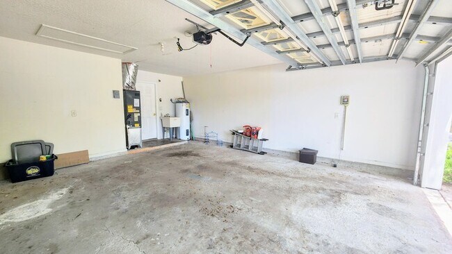 Building Photo - Spacious 4BR w/ Fenced Yard + Covered Lanai + 2 Car Garage  in Orange Park!