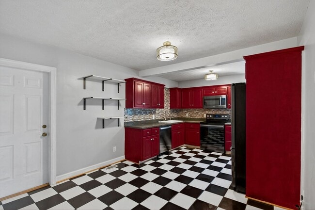 Building Photo - 4 Bedroom Rental