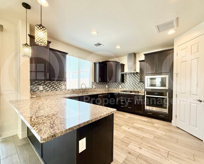 Building Photo - 9576 W Donald Dr