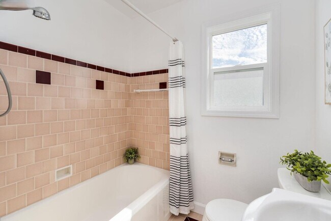 Building Photo - Light-Filled San Leandro Gem w/ Dual Garages & Expansive Yard