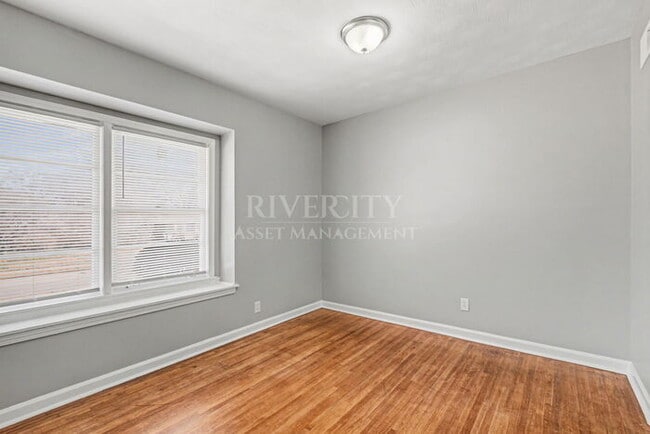 Building Photo - A MUST SEE LOCATED IN A BEAUTIFUL PART OF THE CITY!!!!!! SECTION 8 WELCOMED!!